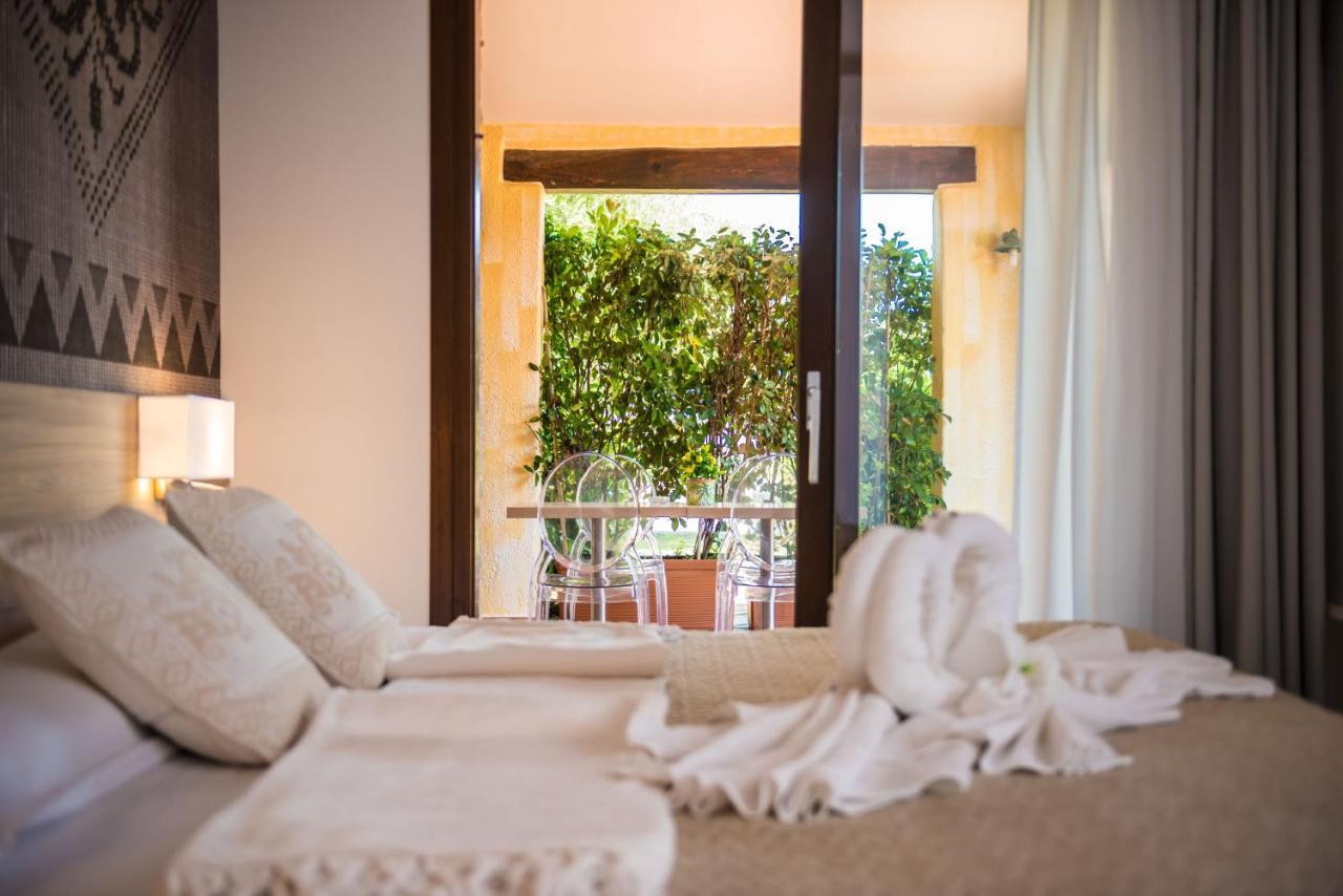 Hotel Relais Del Borgo- Domo Loiri Porto San Paolo Exterior foto